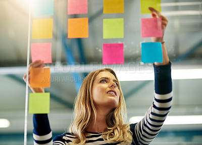 Buy stock photo Woman, sticky note and glass wall for research project or brainstorming planning, ideas or company. Female person, paper and moodboard inspiration for creative mind map or startup, office or goals