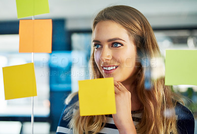 Buy stock photo Thinking, creative and woman with notes on glass wall for planning, future ideas and business schedule. Thoughts, girl and reading mind map with information, presentation agenda and project timeline