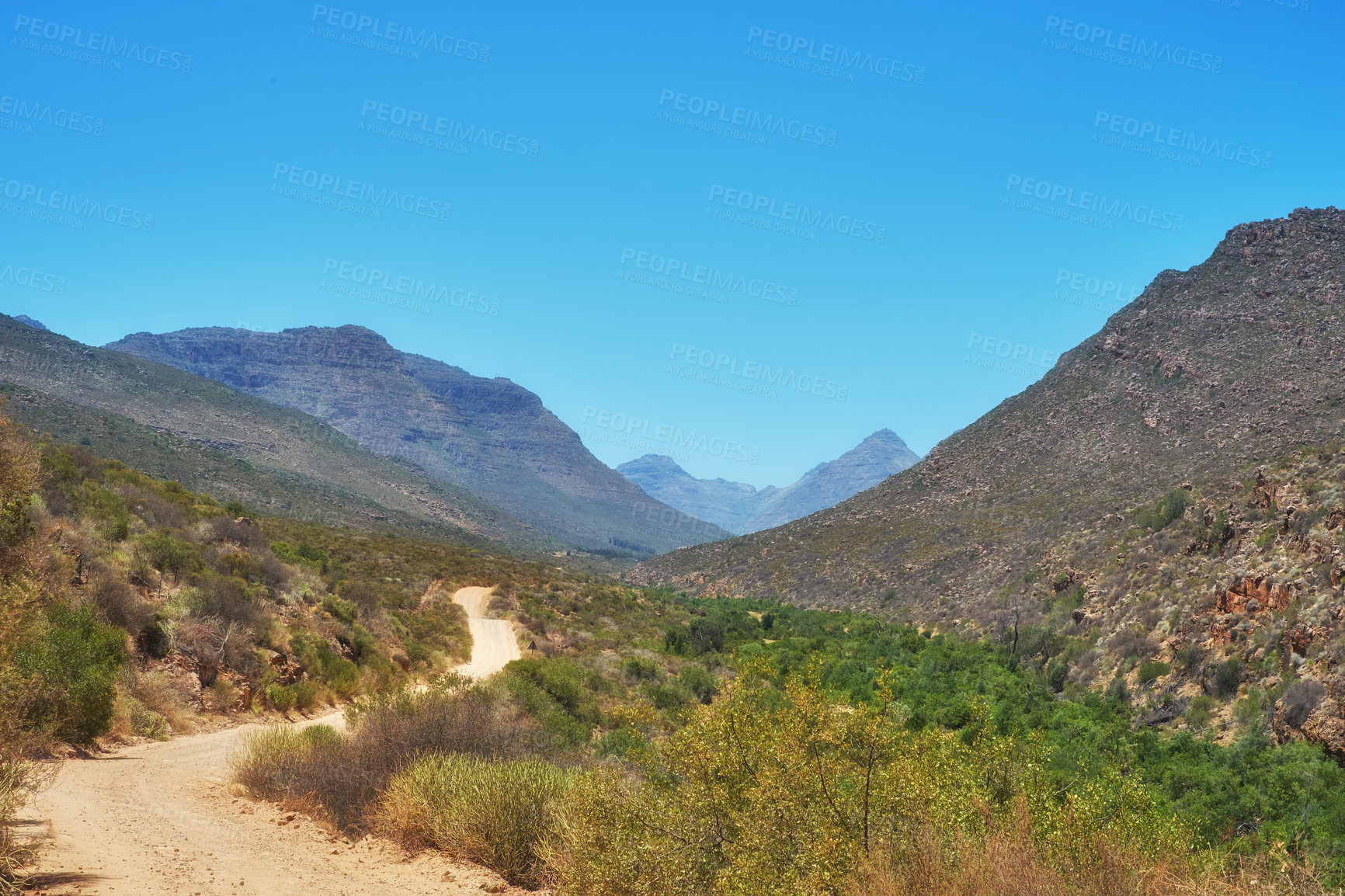 Buy stock photo Outdoor, nature and path in hill bush, holiday location and peace in sustainable landscape. Earth, meadow trail and texture to explore on vacation, remote adventure and wild environment for travel