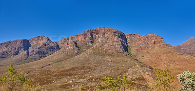 Buy stock photo Outdoor, wild and view of mountain in nature, holiday location and peace in sustainable landscape. Earth, countryside and hills to explore on vacation, remote adventure and environment for travel