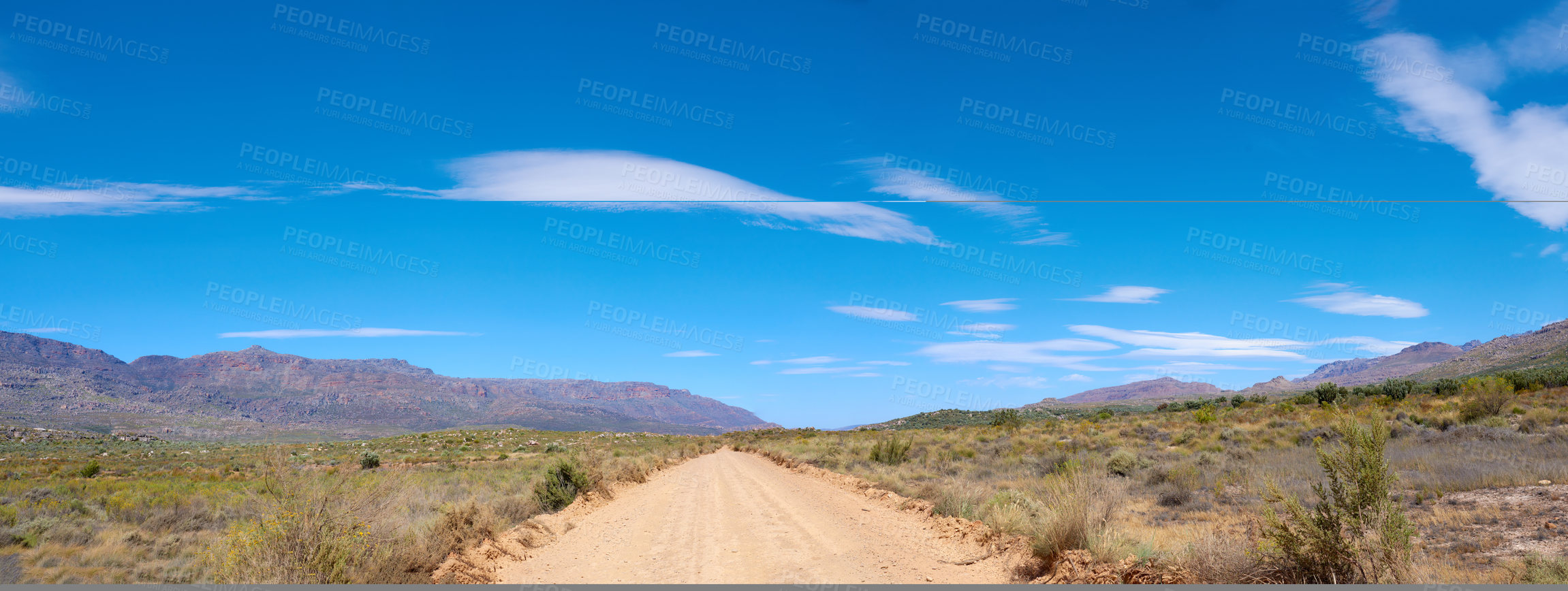 Buy stock photo Dirt road, mountains and landscape with nature, blue sky and adventure with tourism. Empty, travel and hills with Australia desert, ecology or plants with environment, carefree and arid with clouds