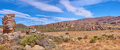 Buy stock photo Nature, savannah and outdoor with rock, formation and geology at location in environment in summer. Countryside, stone and ecosystem with mountain, erosion or outcrop in sunshine on terrain in Mexico