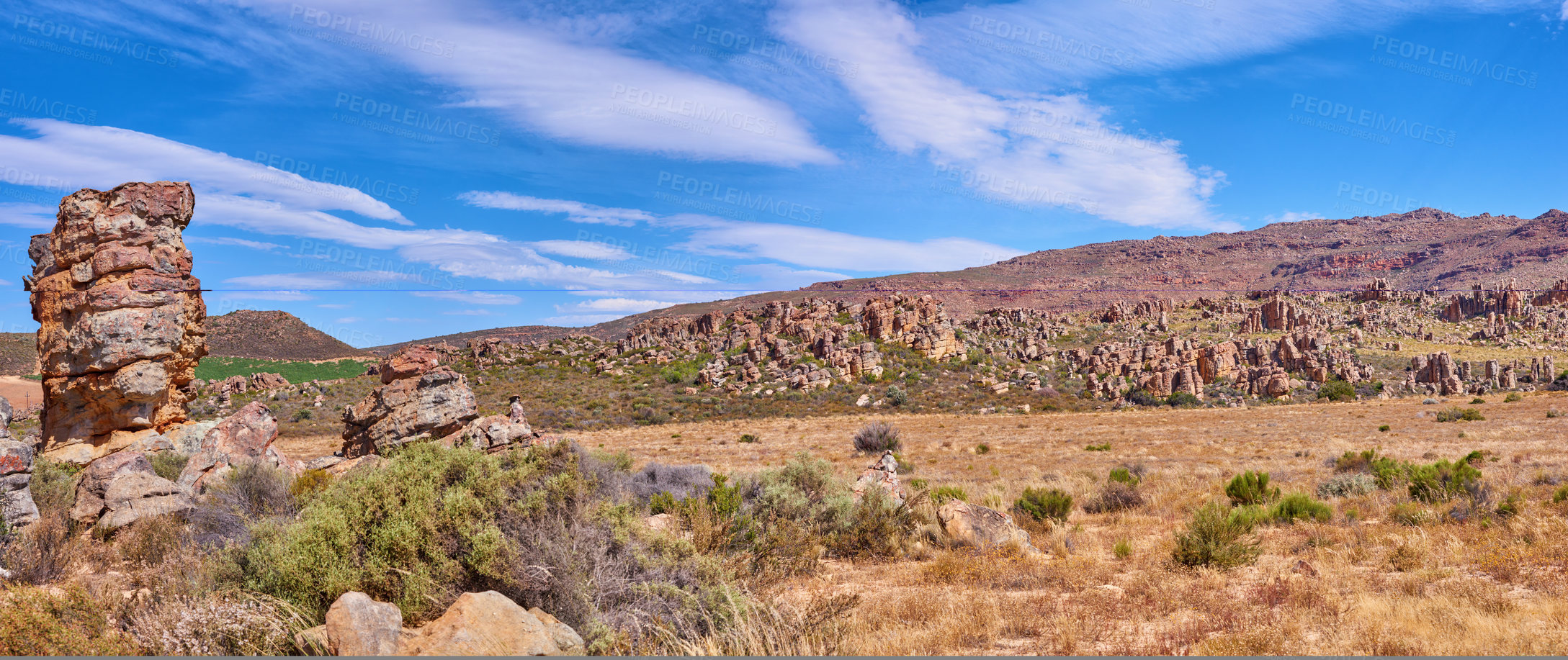 Buy stock photo Nature, savannah and outdoor with rock, formation and geology at location in environment in summer. Countryside, stone and ecosystem with mountain, erosion or outcrop in sunshine on terrain in Mexico