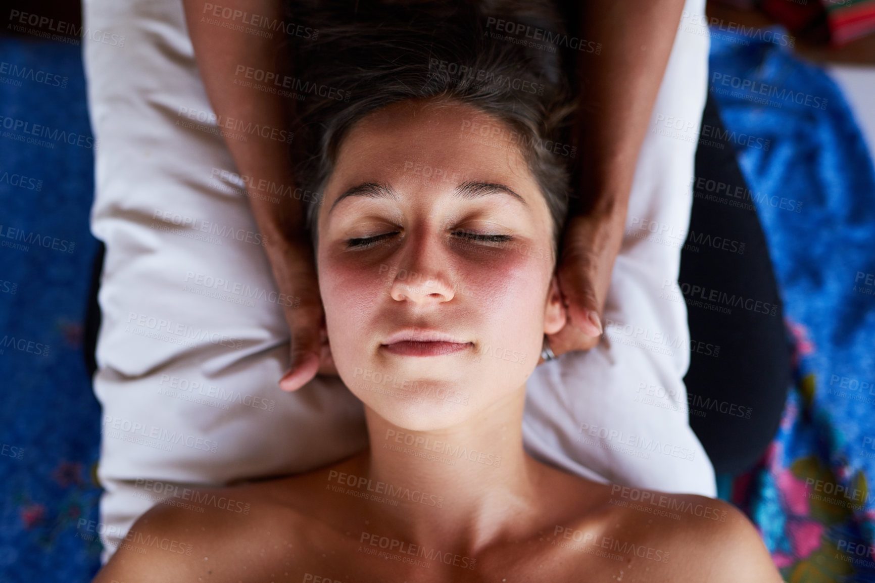 Buy stock photo High angle shot of a young woman getting a relaxing massage at the spa