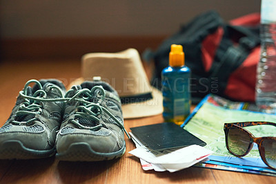 Buy stock photo Cropped shot of travelling essentials on a table
