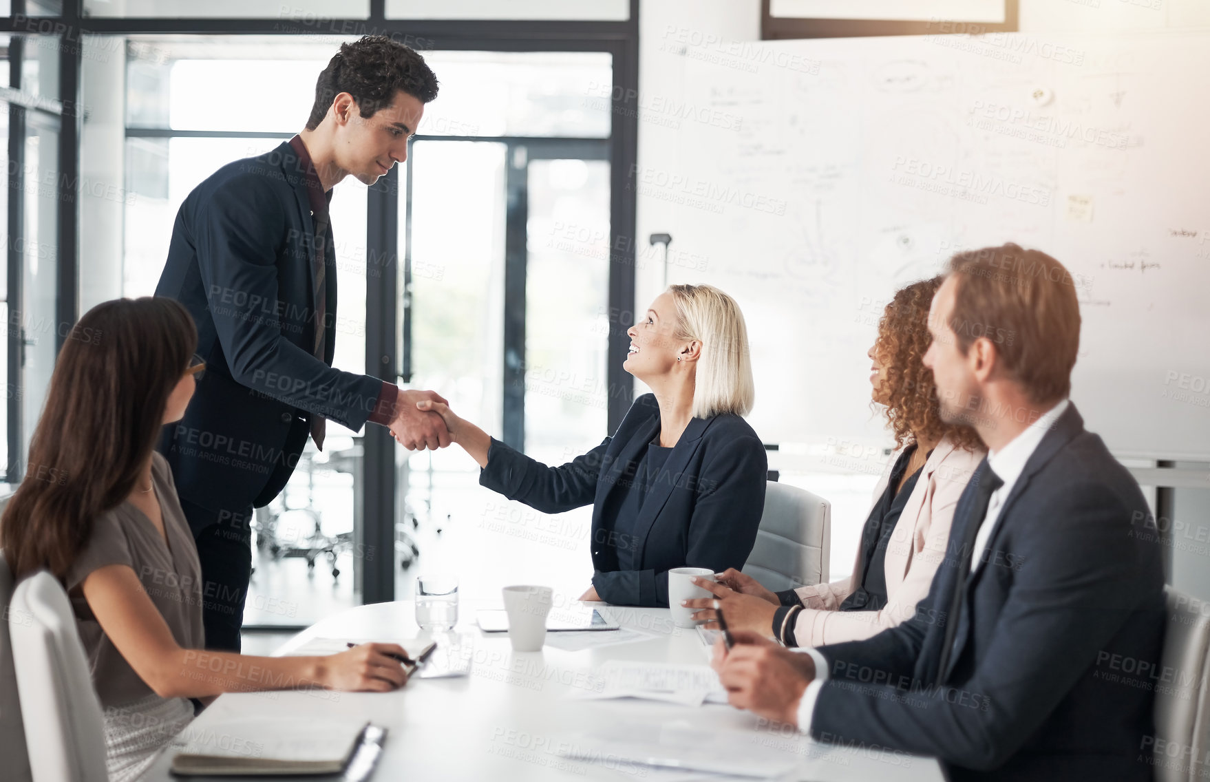 Buy stock photo Business people, handshake and meeting for greeting, introduction or partnership in conference at office. Businessman shaking hands with woman in teamwork, b2b or deal for agreement at the workplace