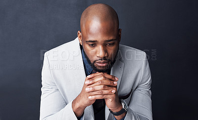 Buy stock photo Praying, sign and business man sad for career, job or work opportunity and god help or support. Corporate african person with depression and prayer hands for religion isolated on dark wall background