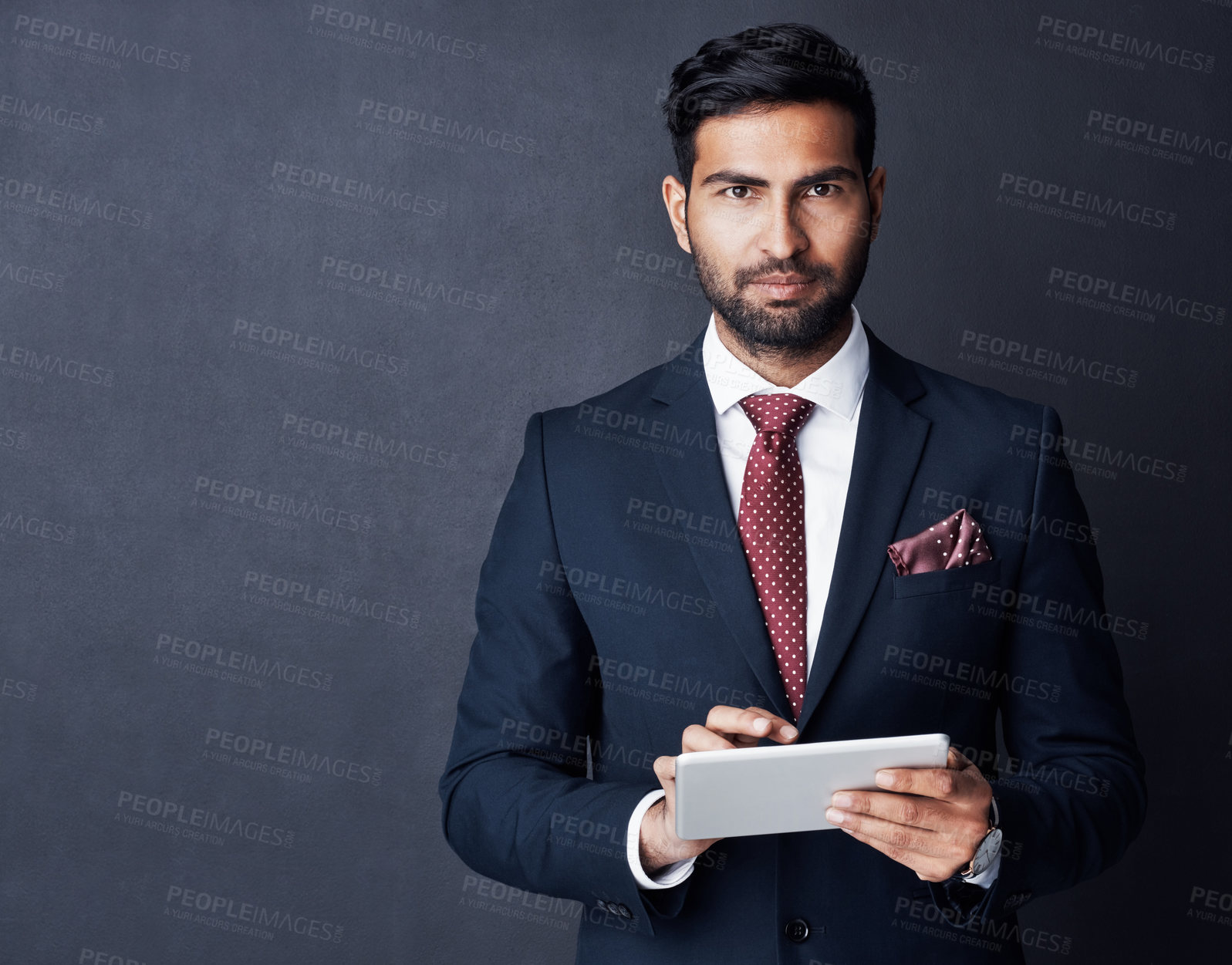 Buy stock photo Portrait, businessman or tablet in studio, mockup space or background for trading, planning or research. Corporate trader, serious indian man in suit or digital technology of online stocks investment