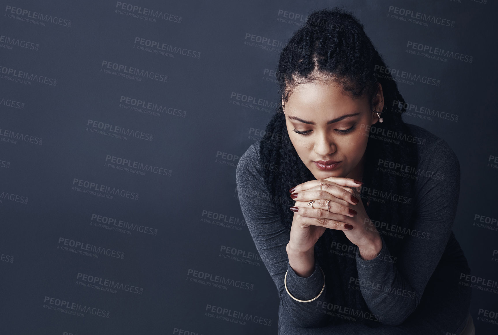 Buy stock photo Sad, mockup space and African woman in studio with upset, depression and unhappy emotions. Mental health, thinking and isolated person with hurt for crisis, mistake and anxiety on dark background