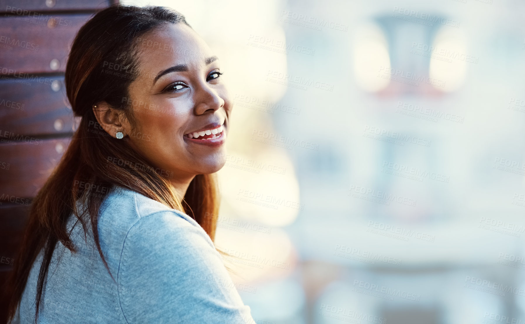 Buy stock photo Portrait of an attractive young businesswoman standing on her office balcony