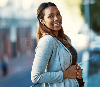 Buy stock photo Portrait of an attractive young businesswoman standing on her office balcony