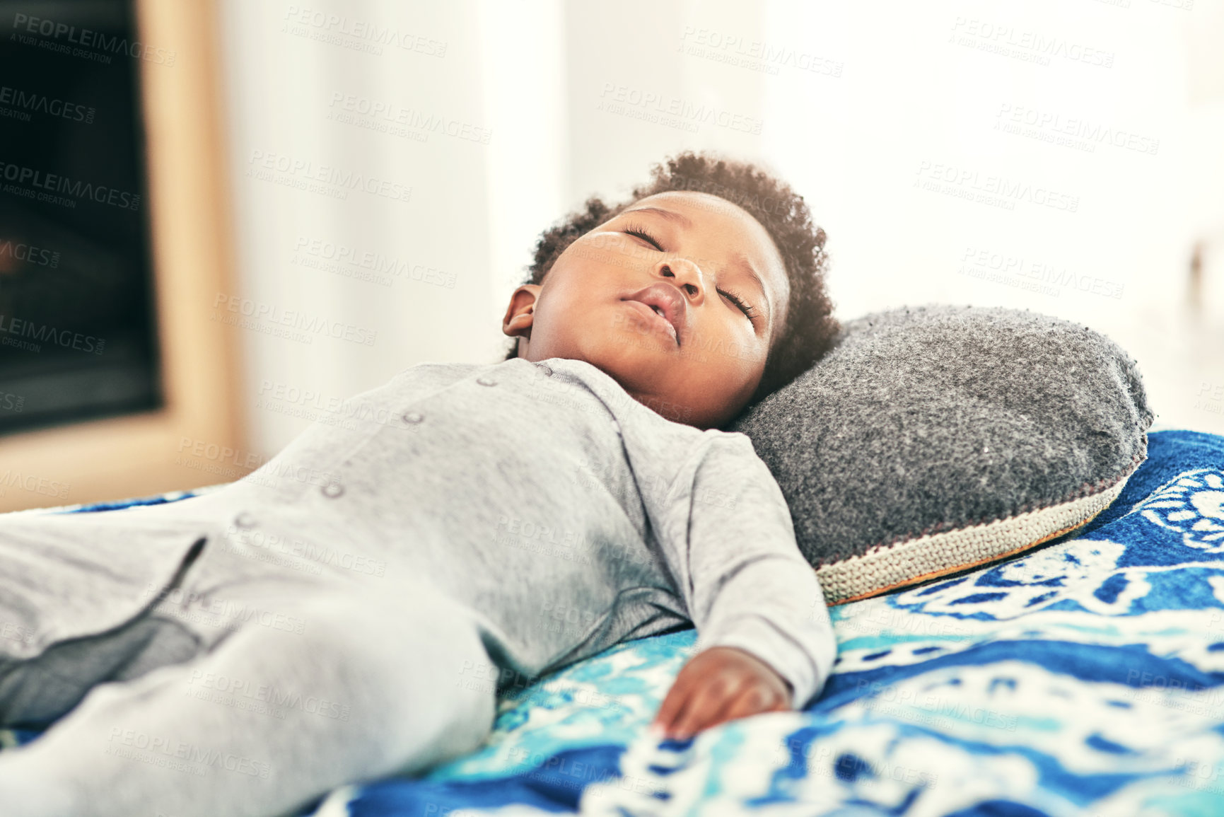 Buy stock photo Baby, sleeping and black child on bed in nursery room for resting, tired or development. Newborn, relax and sweet infant kid lying in bedroom for comfortable, morning nap or dreaming in home