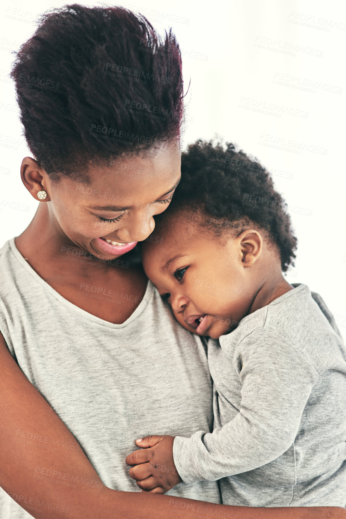 Buy stock photo Mom, baby and happy with hug in home for affection, love and support with kindness for child development. Black people, parent and kid or toddler with bonding for care, growth and trust with smile