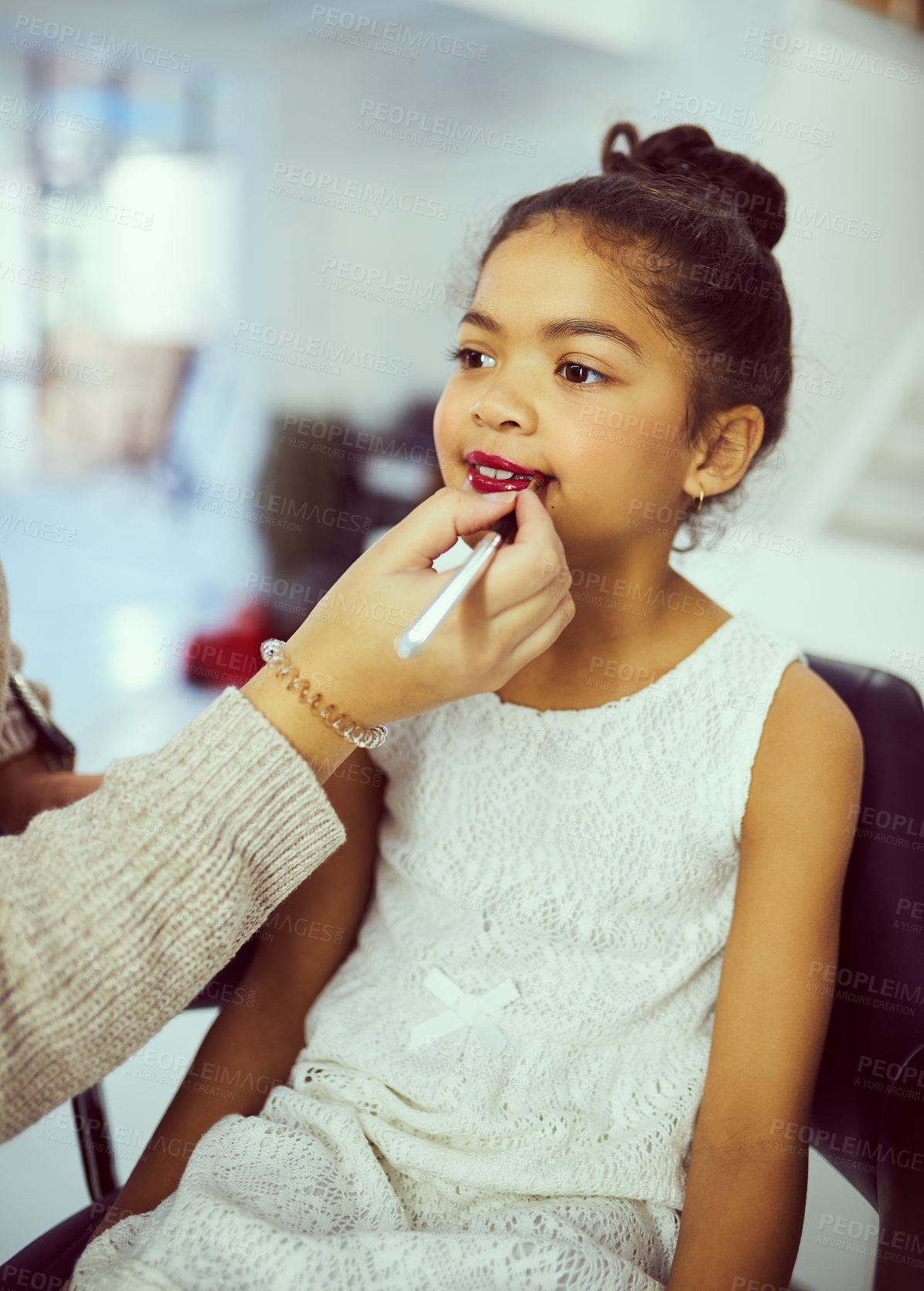 Buy stock photo Backstage, pageant or makeup with girl and stylist in studio, getting ready behind the scenes. Child model, cosmetics and lipstick with woman on set for creative preparation of celebrity talent