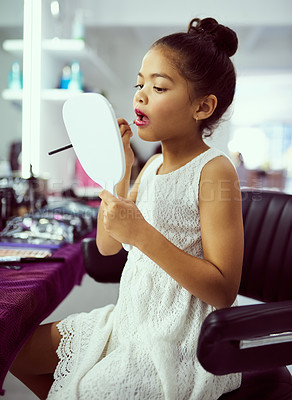 Buy stock photo Young girl or child and makeup with mirror in dressing room for getting ready with for ballet performance. Female kid, cosmetics and lipstick brush for recital preparation backstage with spotlight