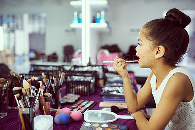 Buy stock photo Young girl and makeup in dressing room getting ready with mirror for ballet performance or show. Female child or dancer with lipstick brush and cosmetics for concentration and preparation backstage