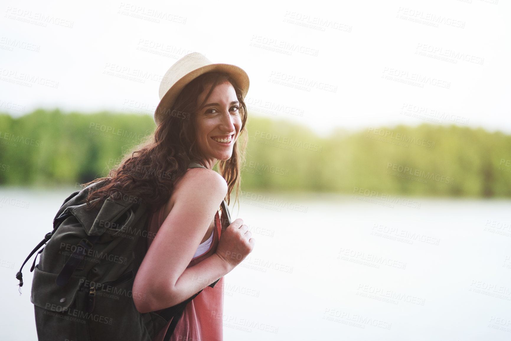 Buy stock photo Hiking woman, portrait and smile for outdoor adventure, summer and explore woods with backpack, excited and happy face. Girl, forest and travel for walk, nature vacation and holiday for exploring