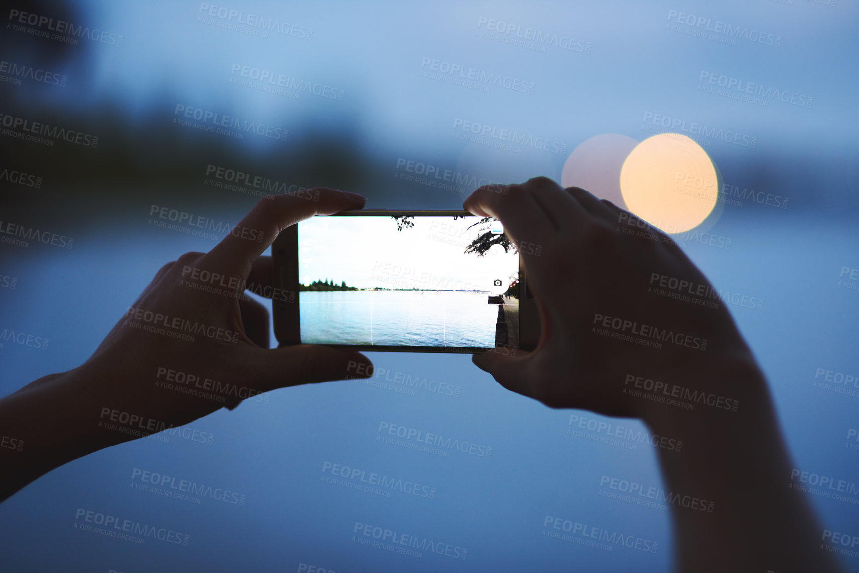 Buy stock photo Sunset, picture and hands of person with phone, screen and social media post of nature, landscape or lake. Mobile, photography or technology for memory of outdoor vacation, holiday and night view