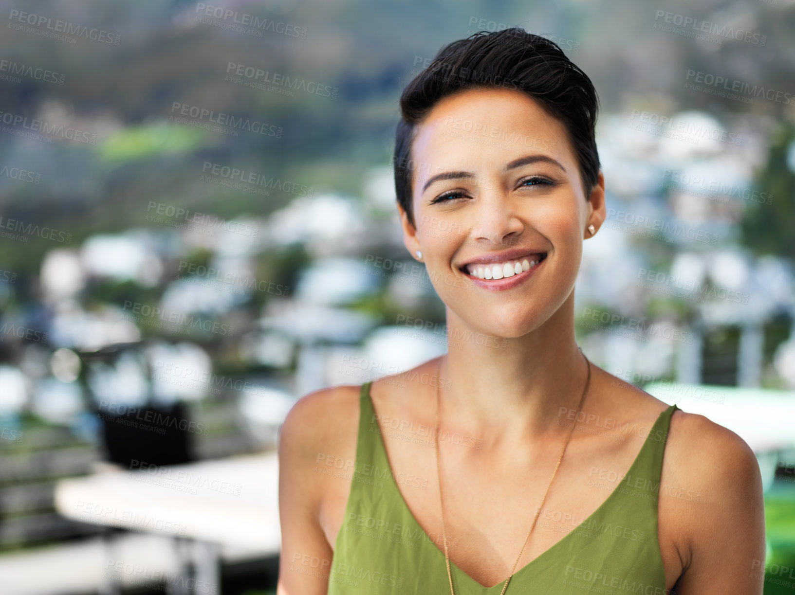 Buy stock photo Portrait of an attractive young woman standing outside