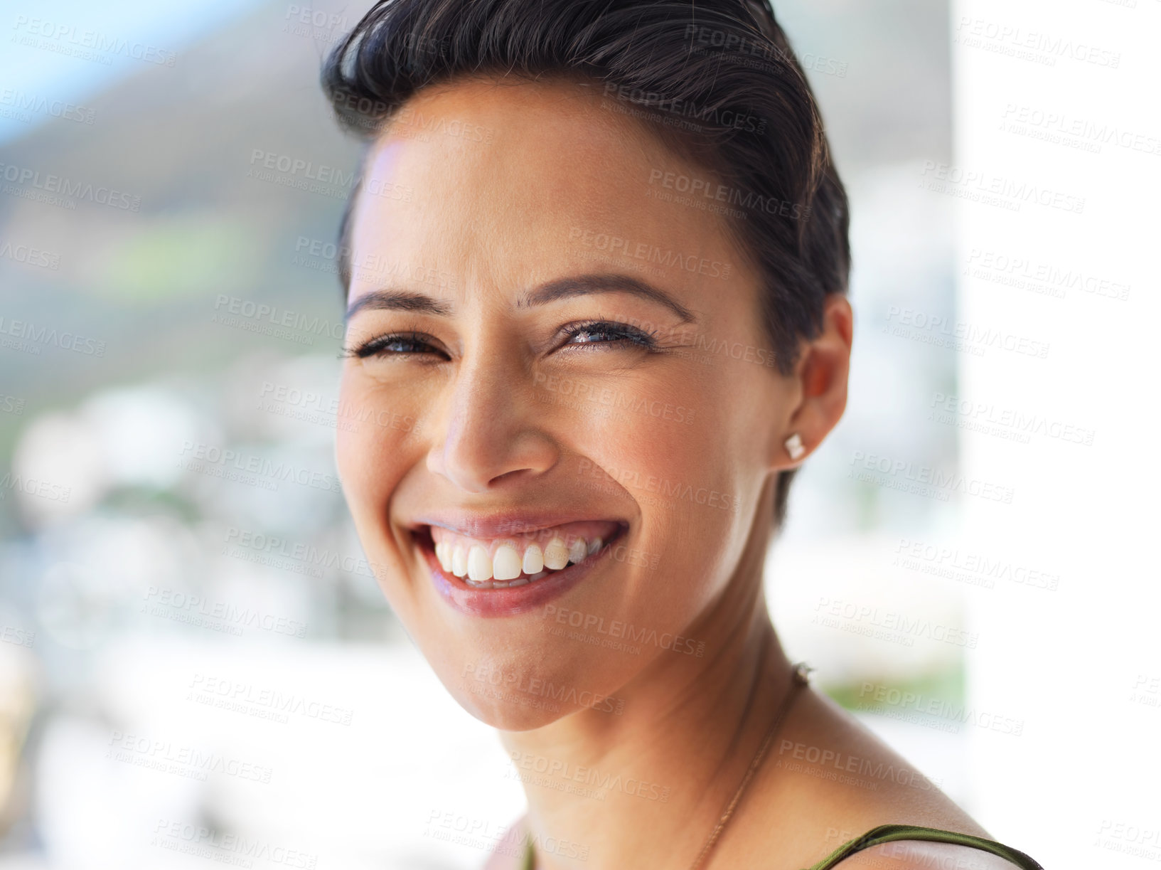 Buy stock photo Portrait of an attractive young woman standing outside