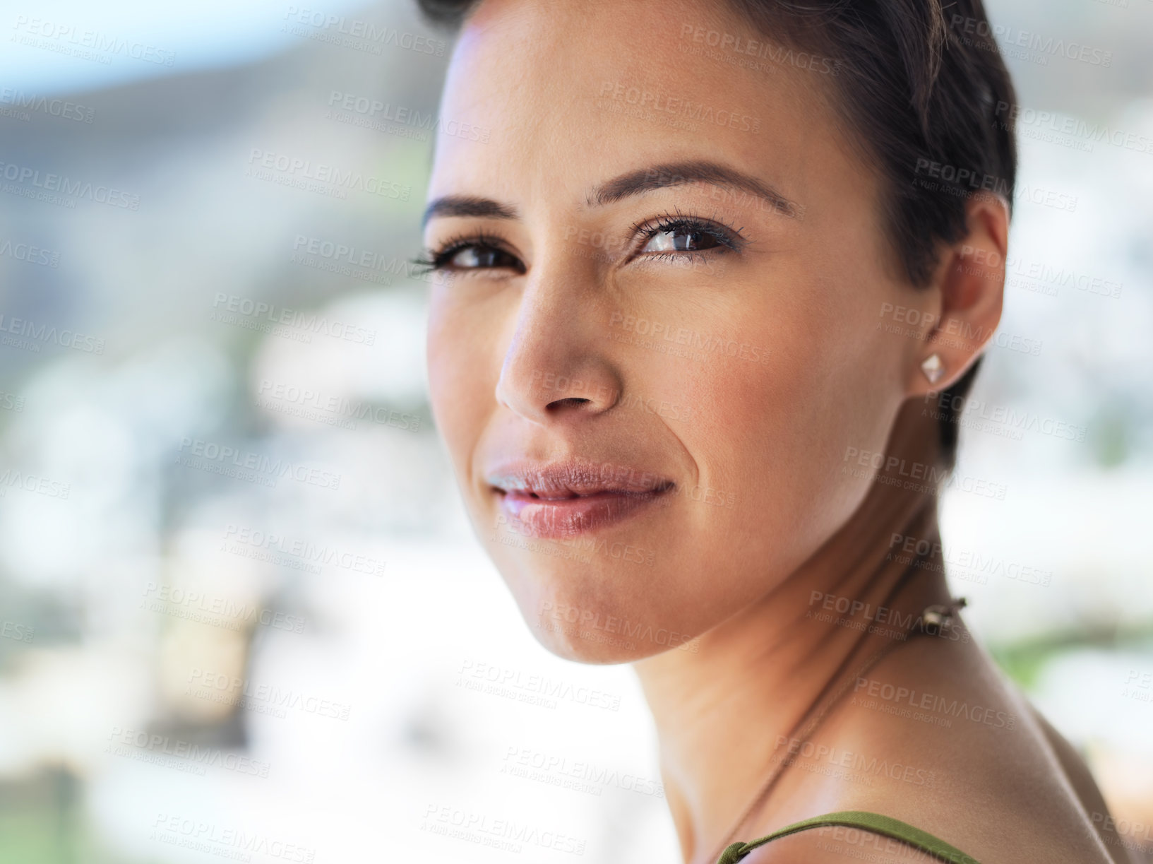 Buy stock photo Portrait of an attractive young woman standing outside