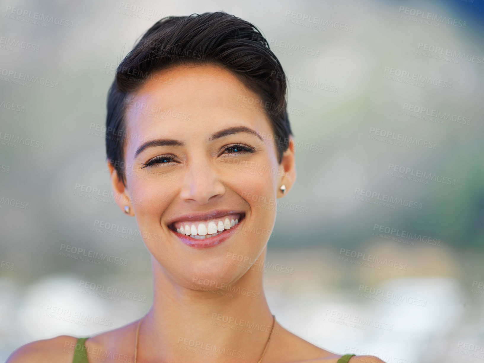 Buy stock photo Portrait of an attractive young woman standing outside