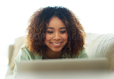 Buy stock photo Laptop, relax and woman on sofa in house browsing for online movie, film or video to watch. Smile, rest and young female person streaming show on internet with computer in living room at apartment.