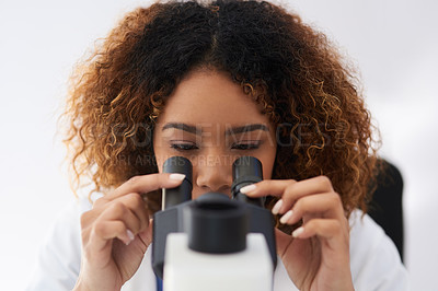 Buy stock photo Female scientist, microscope and analyse in laboratory for innovation or medical breakthrough. Health, data and specialist with doctor in the Netherlands with equipment for stem cell research.