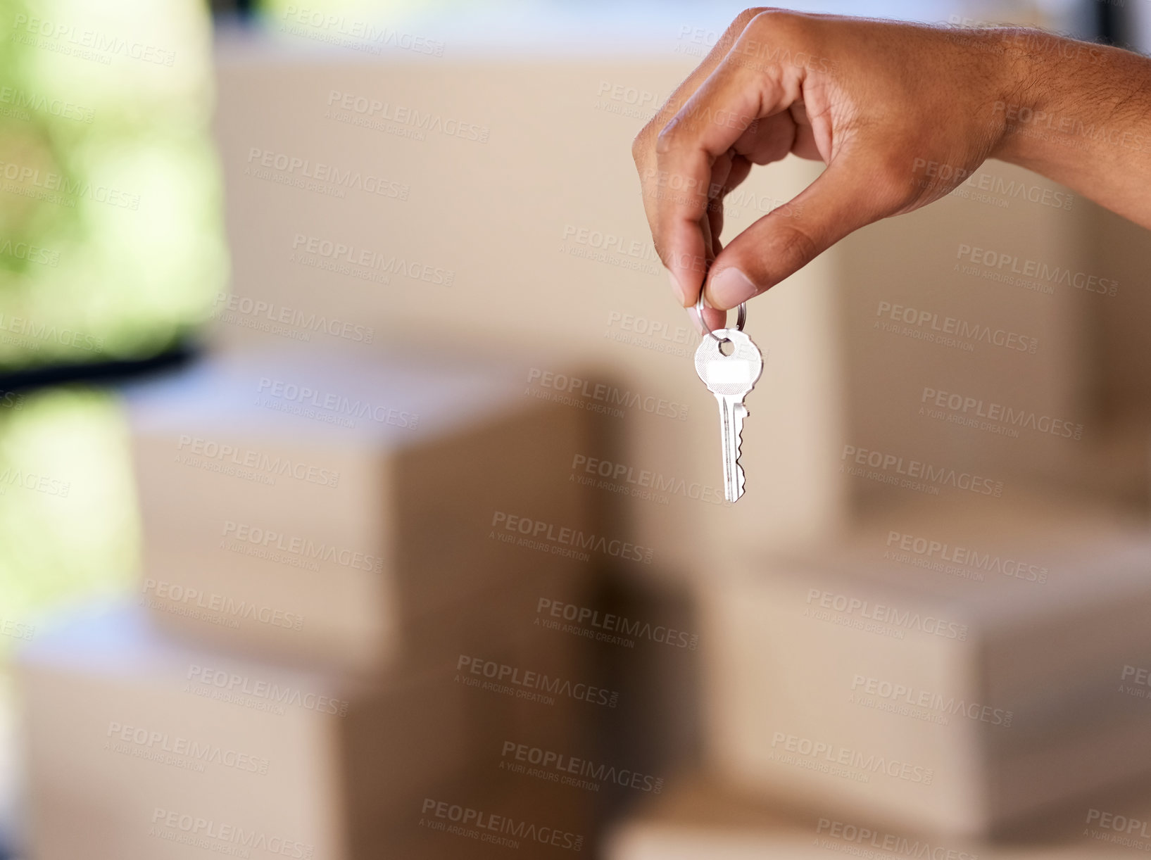 Buy stock photo Man, hand and fingers with key for new home or real estate, boxes for moving or rent. Person, closeup and palm in house with cardboard for property, security or investment with mortgage or loan