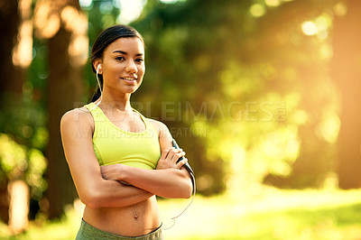 Buy stock photo Shot of a sporty young woman outdoors