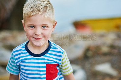 Buy stock photo Portrait, smile and boy child in nature on vacation, travel or summer holiday alone in Switzerland. Face, happy and young cute kid on adventure, journey and recreation for childhood outdoor at park