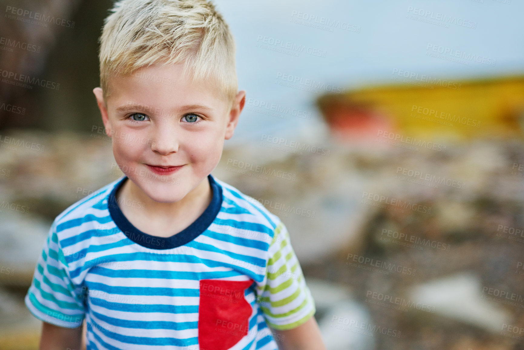 Buy stock photo Portrait, smile and boy child in nature on vacation, travel or summer holiday alone in Switzerland. Face, happy and young cute kid on adventure, journey and recreation for childhood outdoor at park