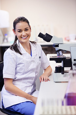 Buy stock photo Portrait of a confident young scientist working in a laboratory