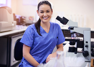 Buy stock photo Portrait of a confident young scientist working in a laboratory