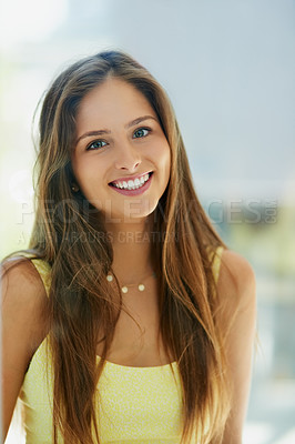 Buy stock photo Portrait of an attractive and happy young woman