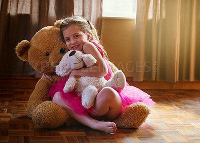 Buy stock photo Shot of a little girl hugging her stuffed animals