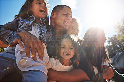 Buy stock photo Portrait of a happy family spending time together outdoors