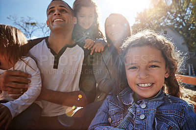 Buy stock photo Portrait of a happy family spending time together outdoors