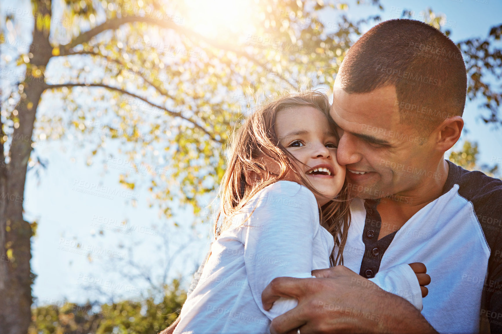 Buy stock photo Happy, girl and hug from dad in garden, park or relax on adventure in summer, vacation or holiday. Father, love and care for child and bonding on travel in countryside or environment with family