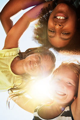 Buy stock photo Happy, low angle and portrait of children with sunshine for friendship, playing and fun on camp. Diversity, youth and girls huddle for childhood, game and hug for school, recess and playground