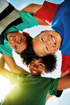 Buy stock photo Happy, low angle and portrait of boys in summer for friendship, playing and fun together. Diversity, youth and children huddle in circle for childhood, game and hug for school, camp and playground