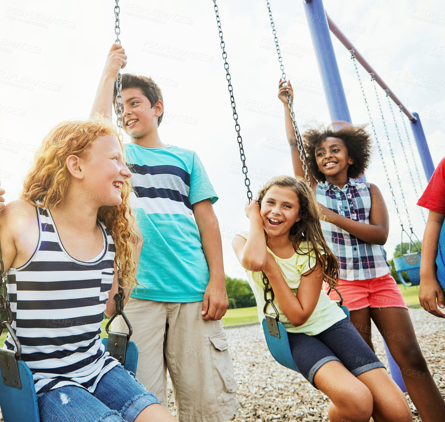 Buy stock photo Smiling, children or kids in park outdoor playing together for friendship, bonding and relationship development. Happy, young people and swing on jungle gym for childhood fun or summer break