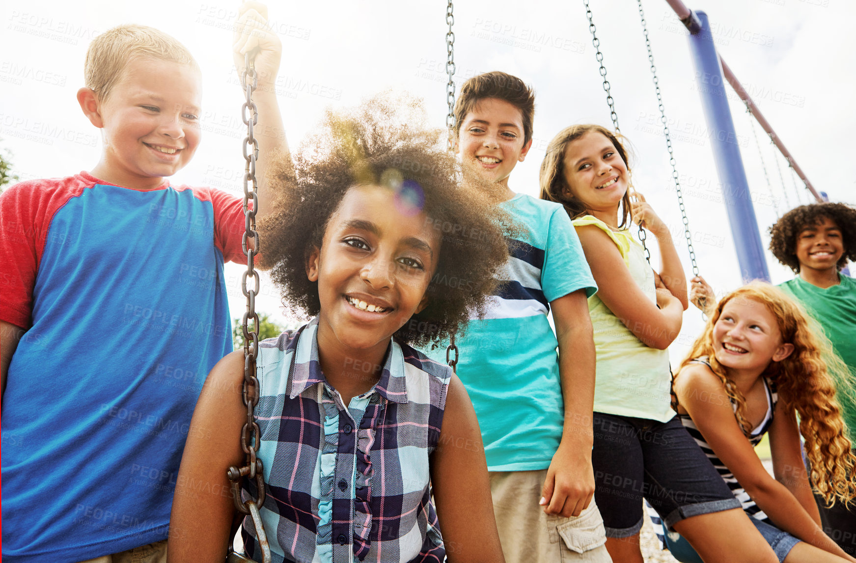 Buy stock photo Cropped shot of a group of young children playing together at the park