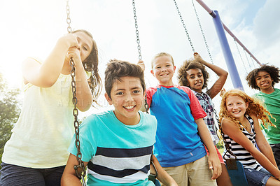 Buy stock photo Portrait of a group of young children playing together at the park