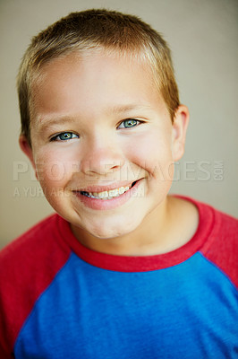 Buy stock photo Studio portrait of a young boy giving you a big smile