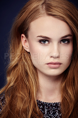 Buy stock photo An attractive young model against a dark background