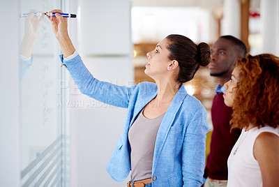 Buy stock photo Problem solving, business people and writing on glass board in meeting for brainstorming, ideas or planning in office. Creative employees, diversity and teamwork for solution, strategy or schedule