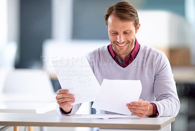 Buy stock photo Business, office and man with paperwork, smile and reading for feedback, planning and review. Person, employee and professional with documents, consultant and report with ideas, research and notes