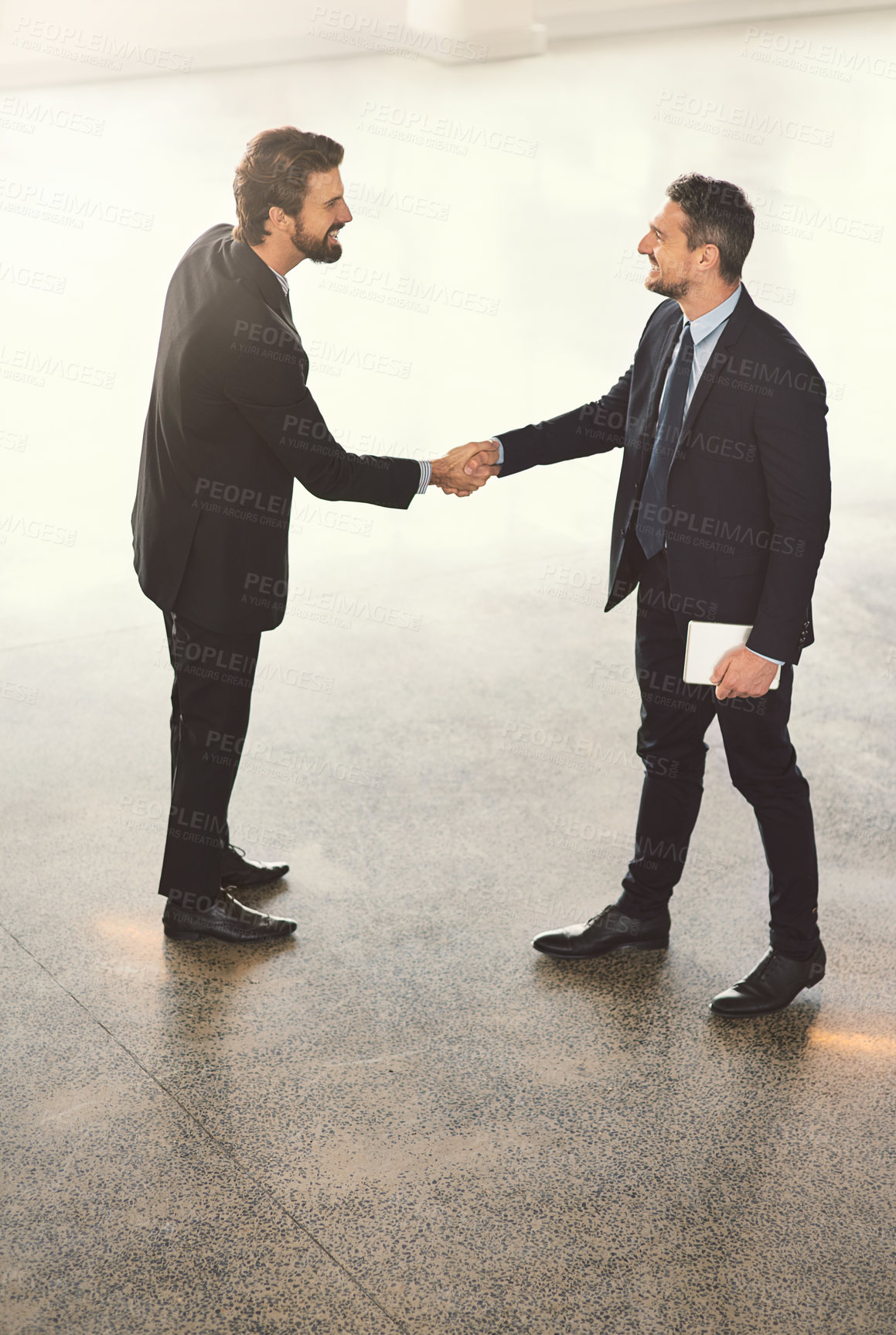 Buy stock photo Above, business people and men with greeting, handshake and partnership with onboarding. Employees, coworkers or b2b deal with cooperation for project, recruitment or collaboration with thank you