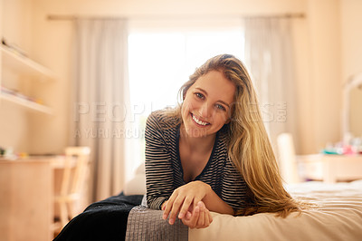 Buy stock photo Full length portrait of an attractive young woman lying on her bed